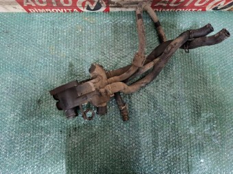 CARCASA (CORP) TERMOSTAT VOLKSWAGEN GOLF IV OEM: 032121111.